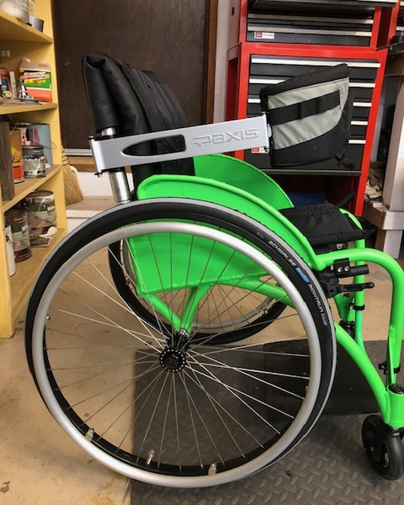 The swing arm starting to swing out from behind the chair